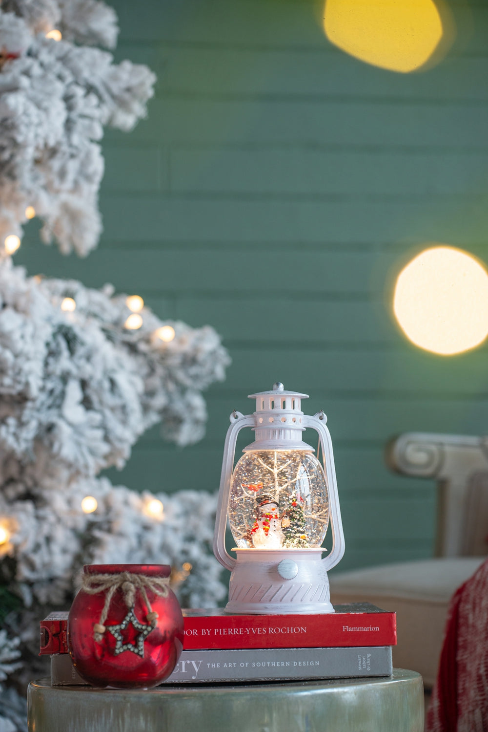 White snow globe lantern with snowman and Christmas tree