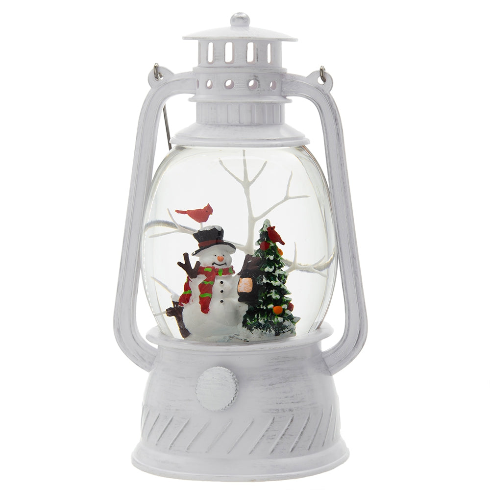 White vintagestyle lantern with a charming snowman figurine and decorated Christmas tree inside