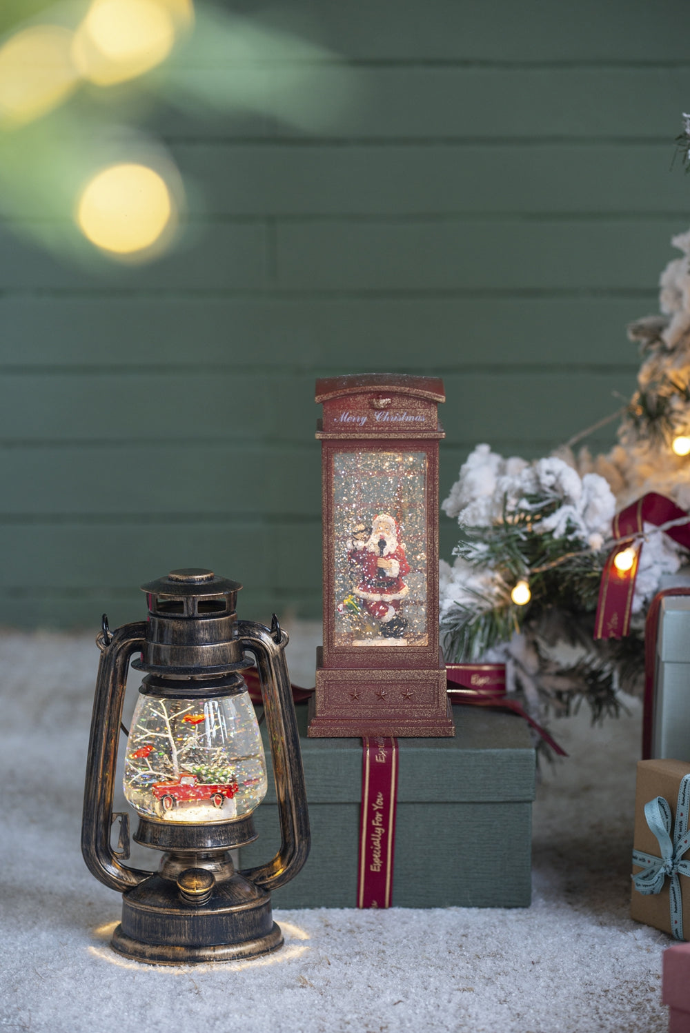 Antique gold lantern with Christmas snow globe scene