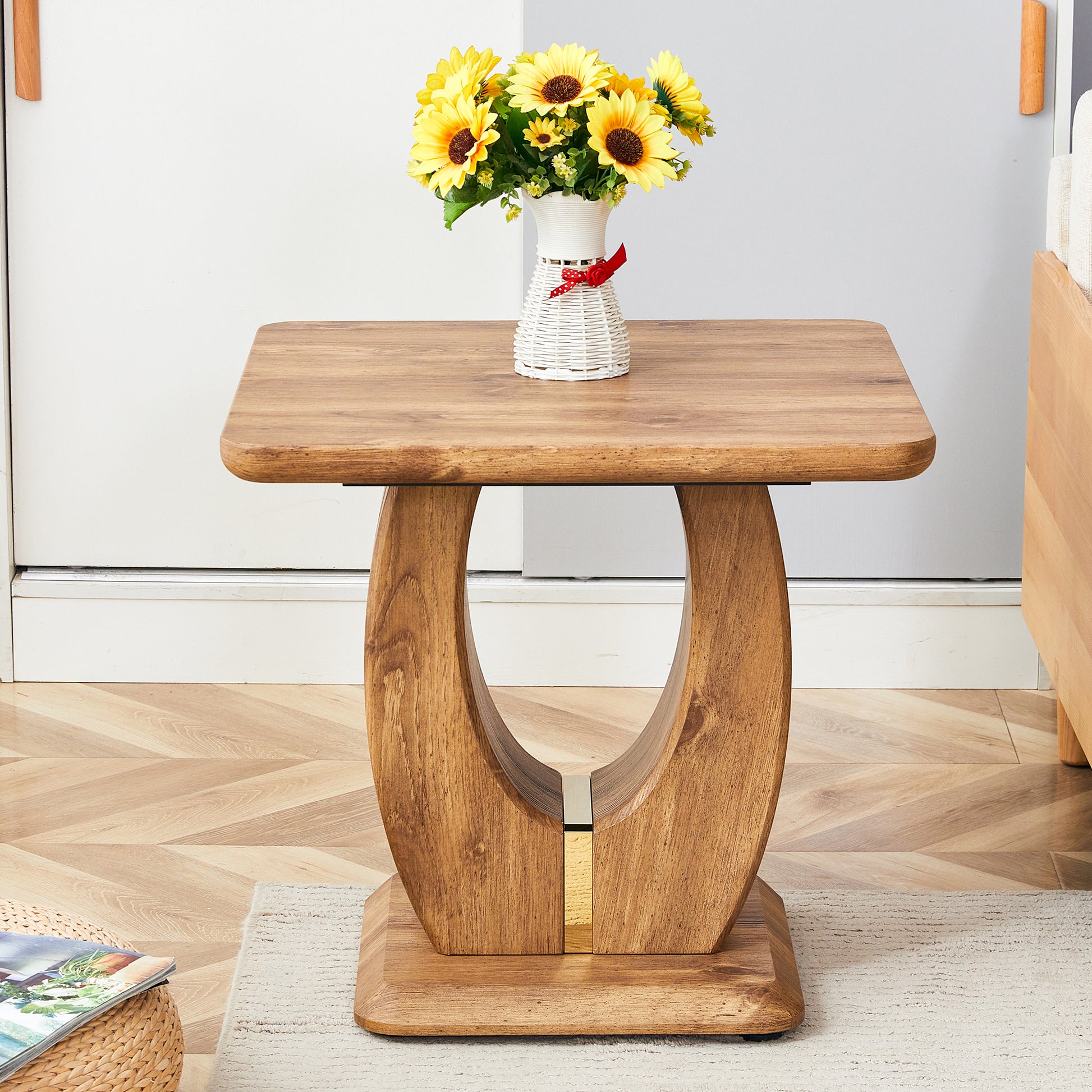 Solid wood accent table with curved pedestal base and golden inlay detail