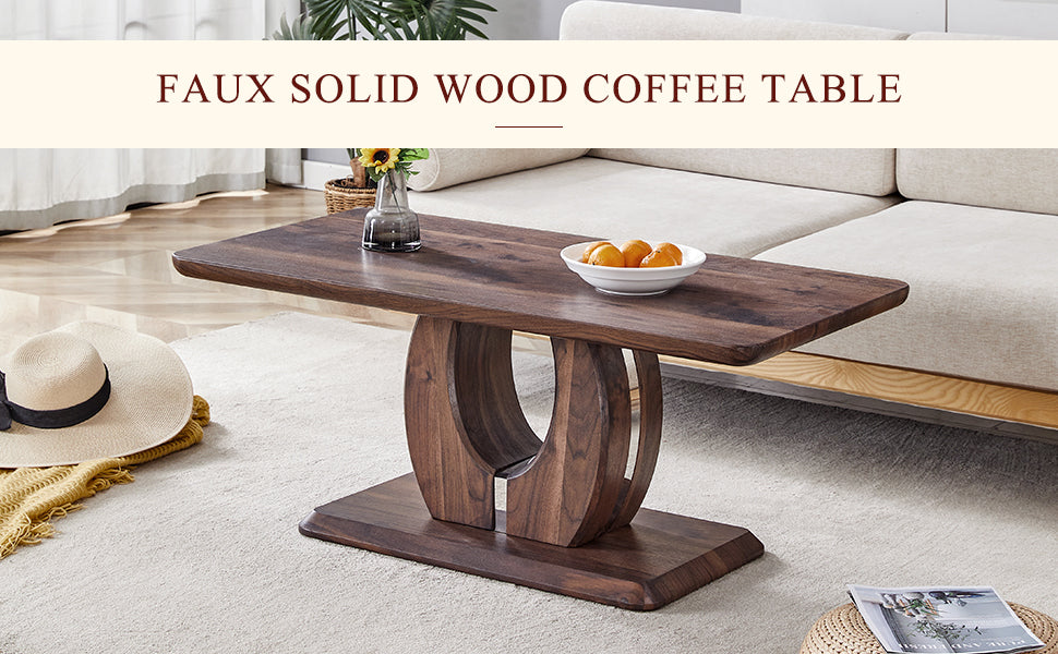 Dark wood coffee table with curved pedestal base