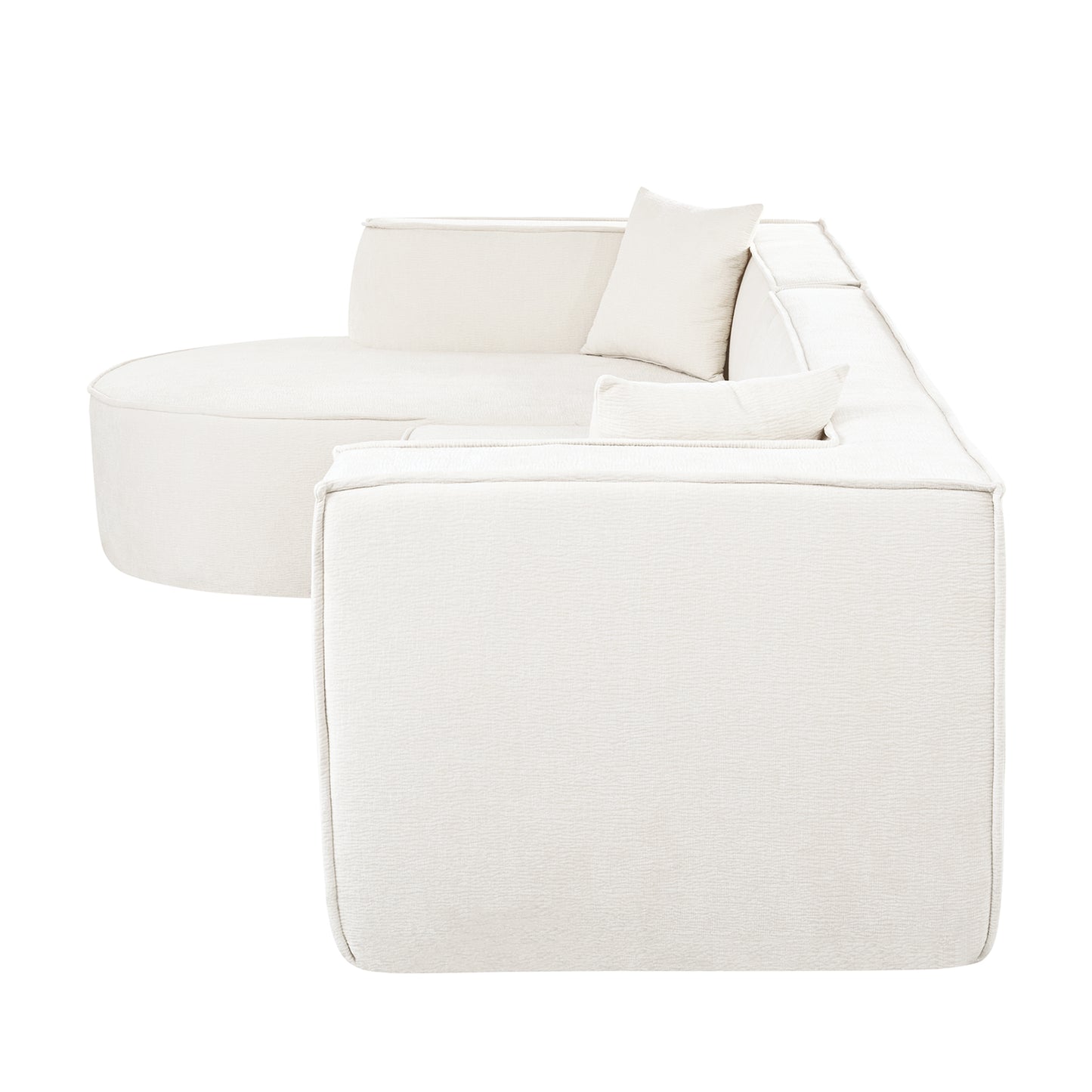 Cream fabric sectional sofa with curved chaise lounge and plush cushions