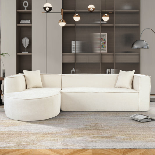 Cream sectional sofa with rounded chaise and textured fabric