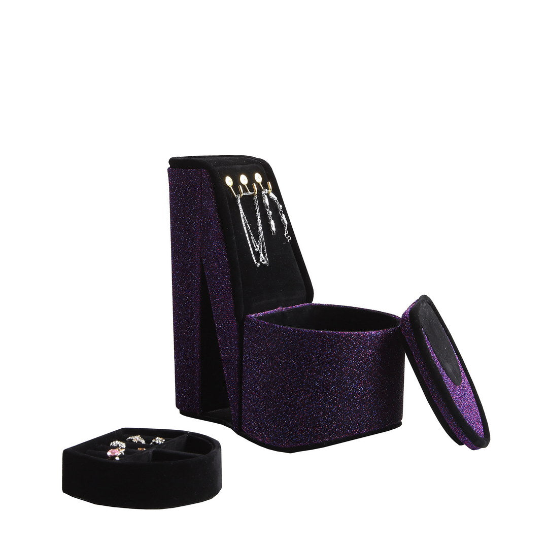 Glittering purple high heel jewelry box with silver necklaces and earrings