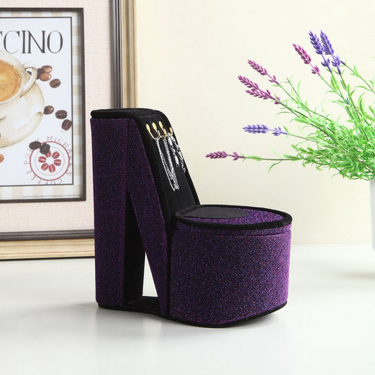 Sparkling purple high heel jewelry organizer with displayed necklaces