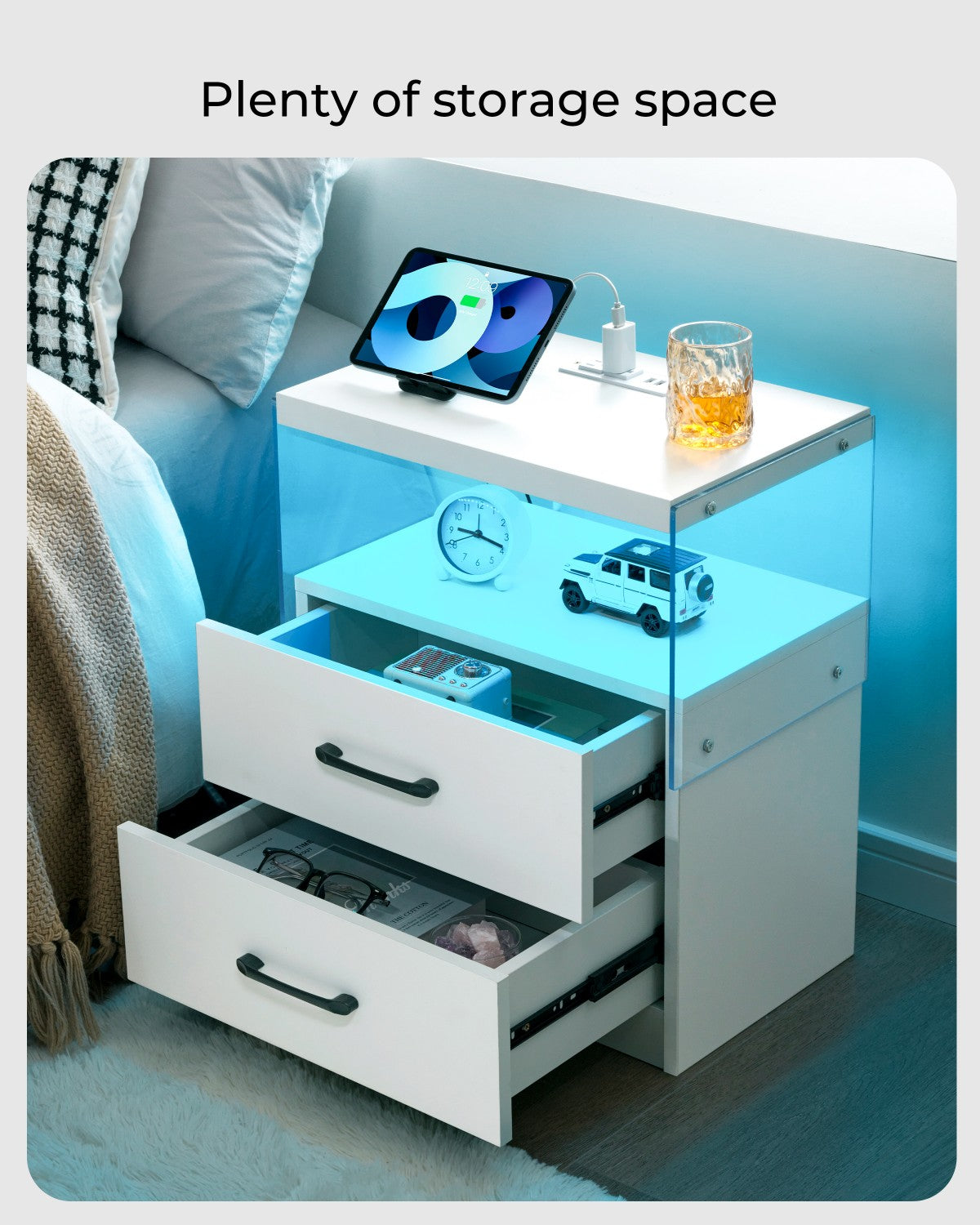 White modern nightstand with LED lighting and three drawers