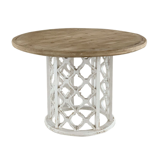 Rustic round dining table with distressed wood top and ornate white base