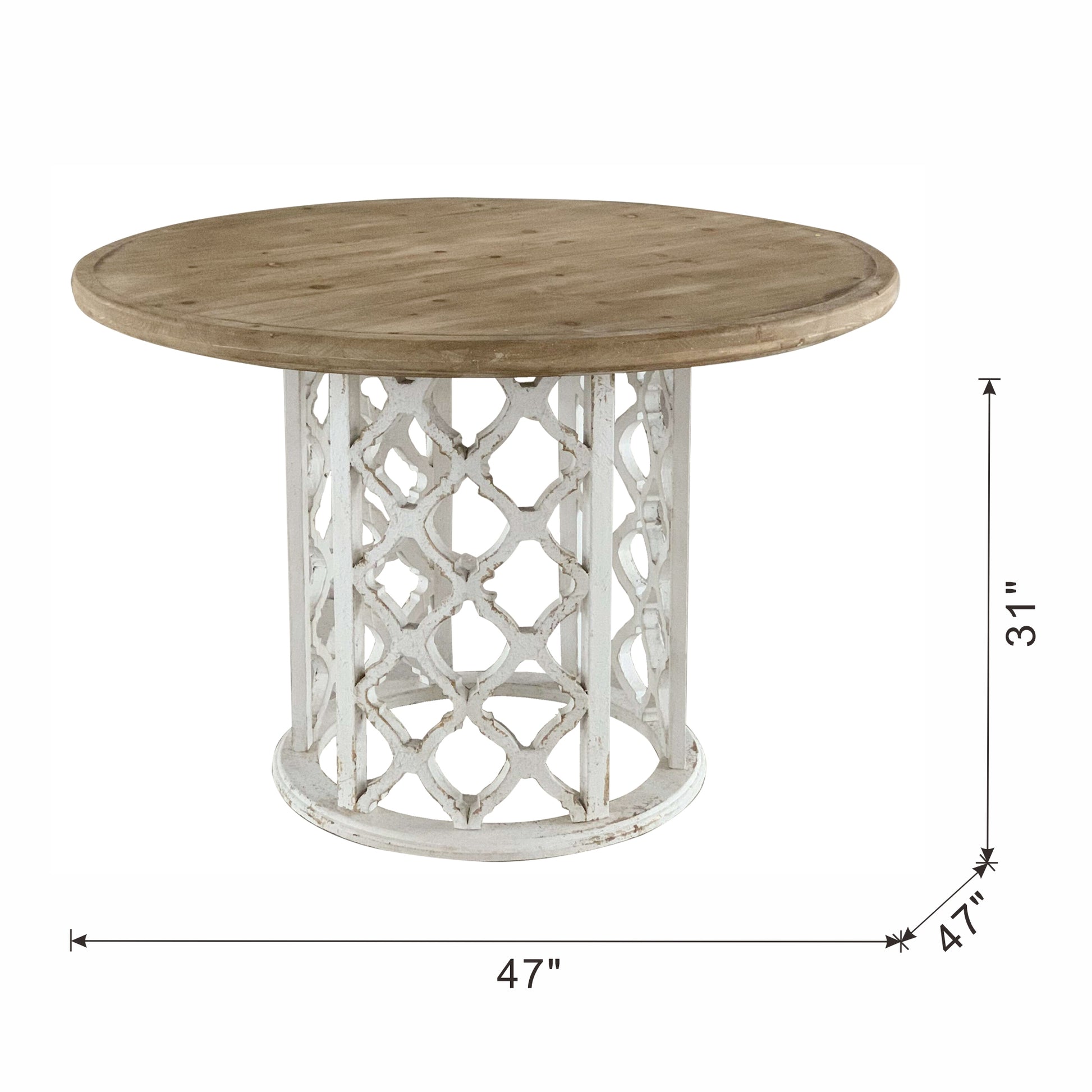 Round whitewashed wood dining table with intricate carved pedestal base