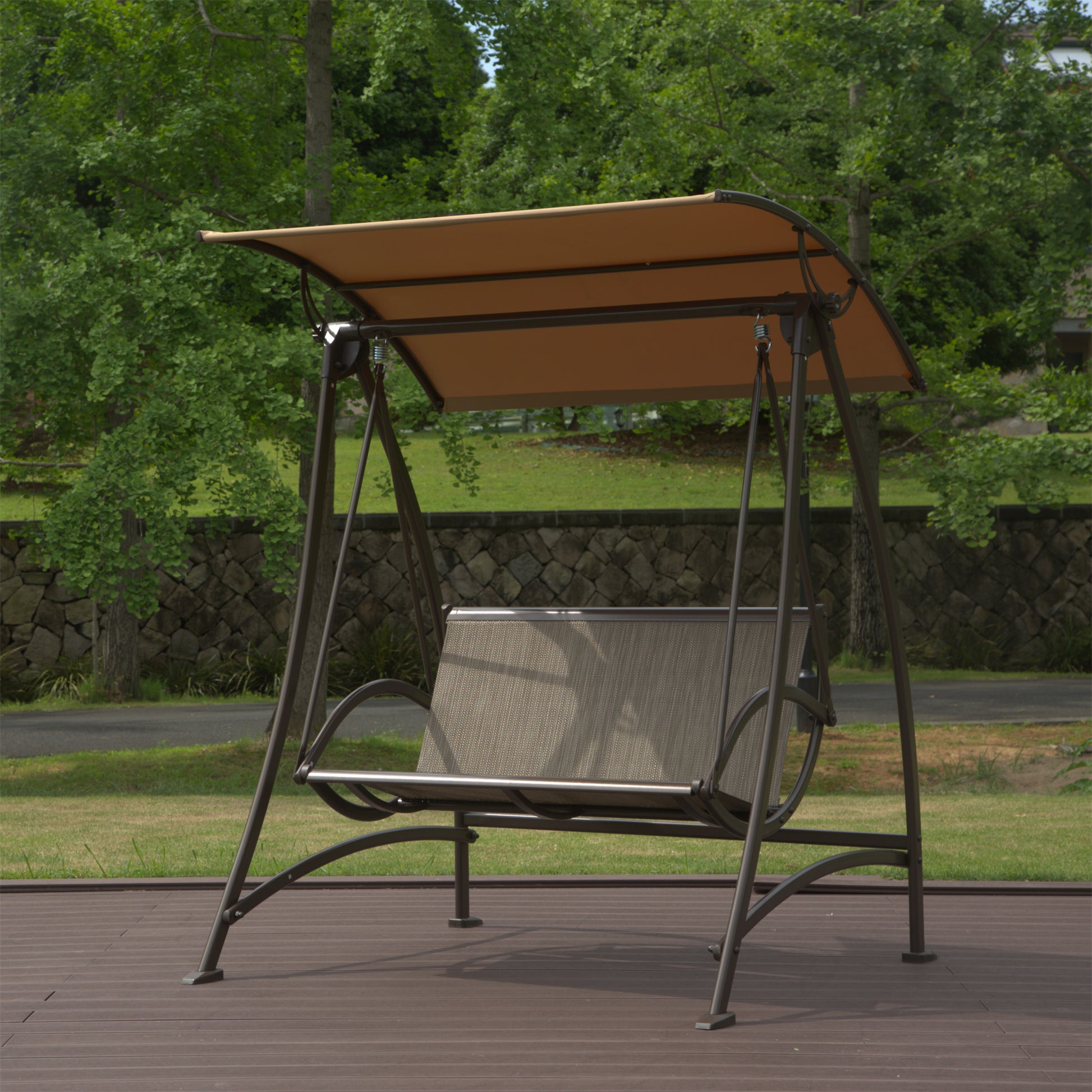Tan canopy patio swing with grey woven seat