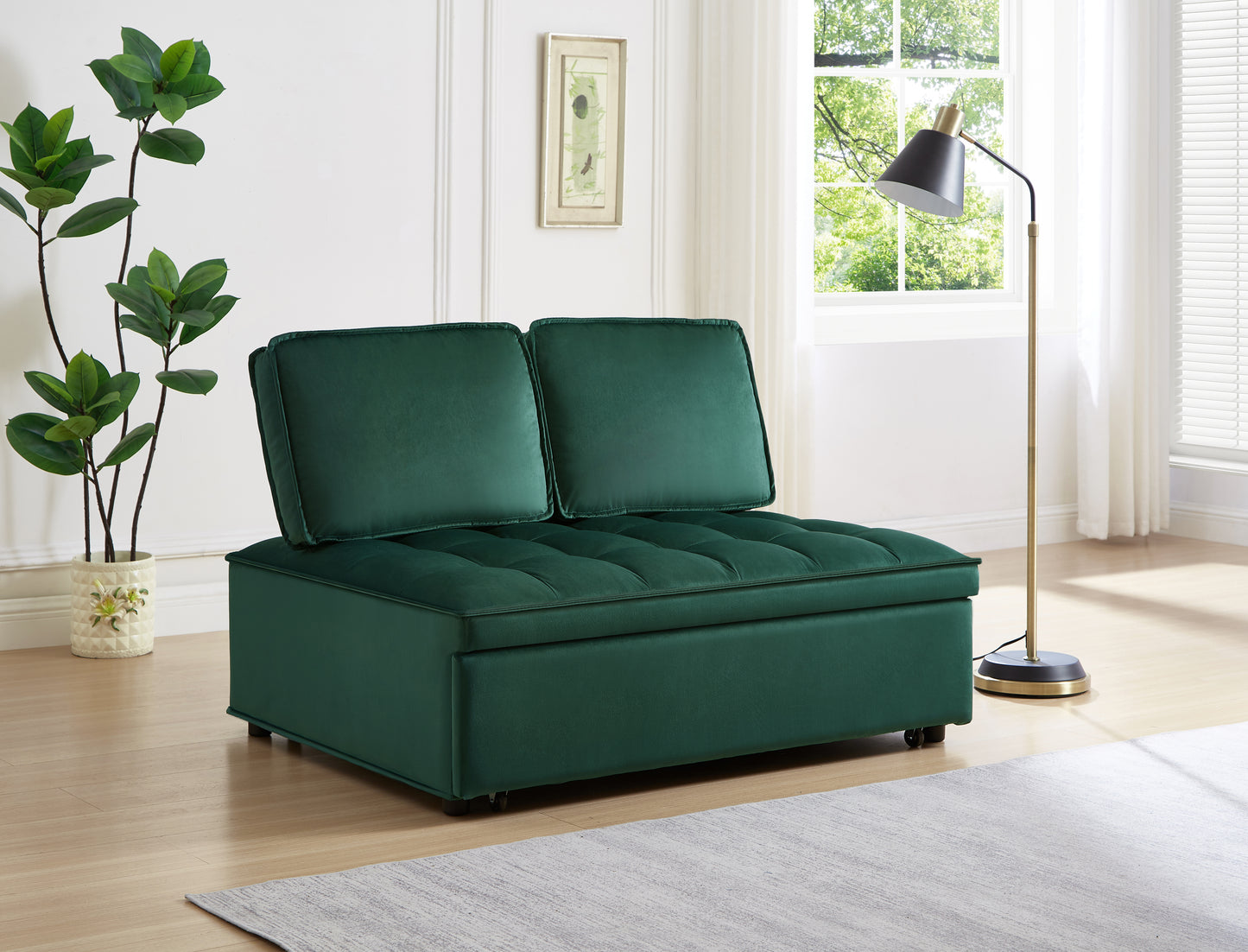 Dark green velvet sleeper sofa with tufted seat and plush cushions