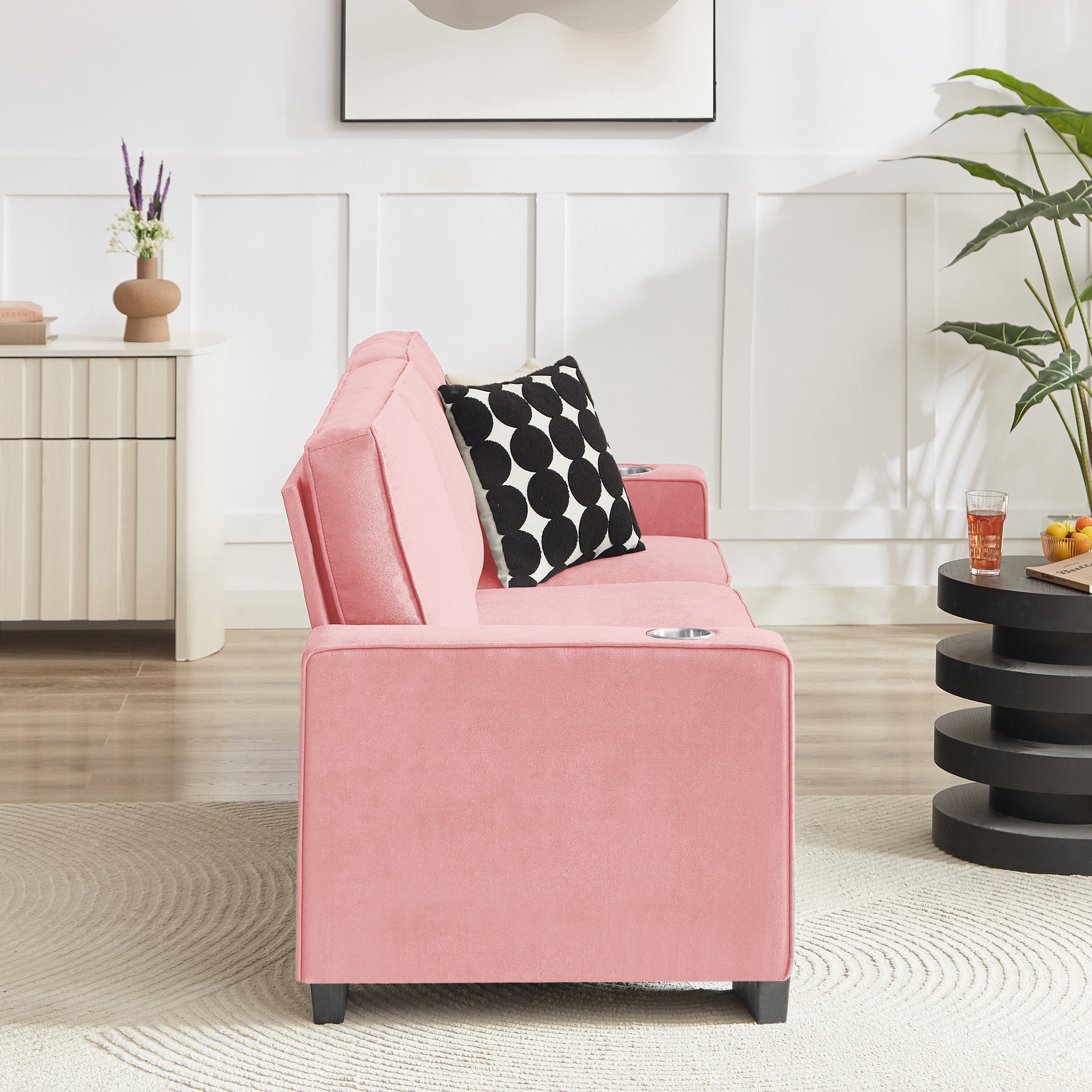Pink velvet sofa with cup holders
