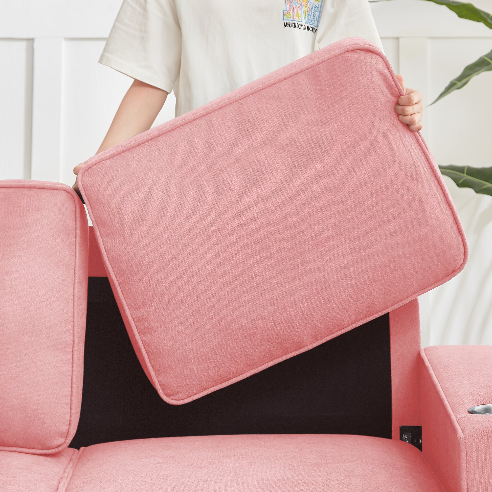 Coral pink plush sofa cushion with piped edges