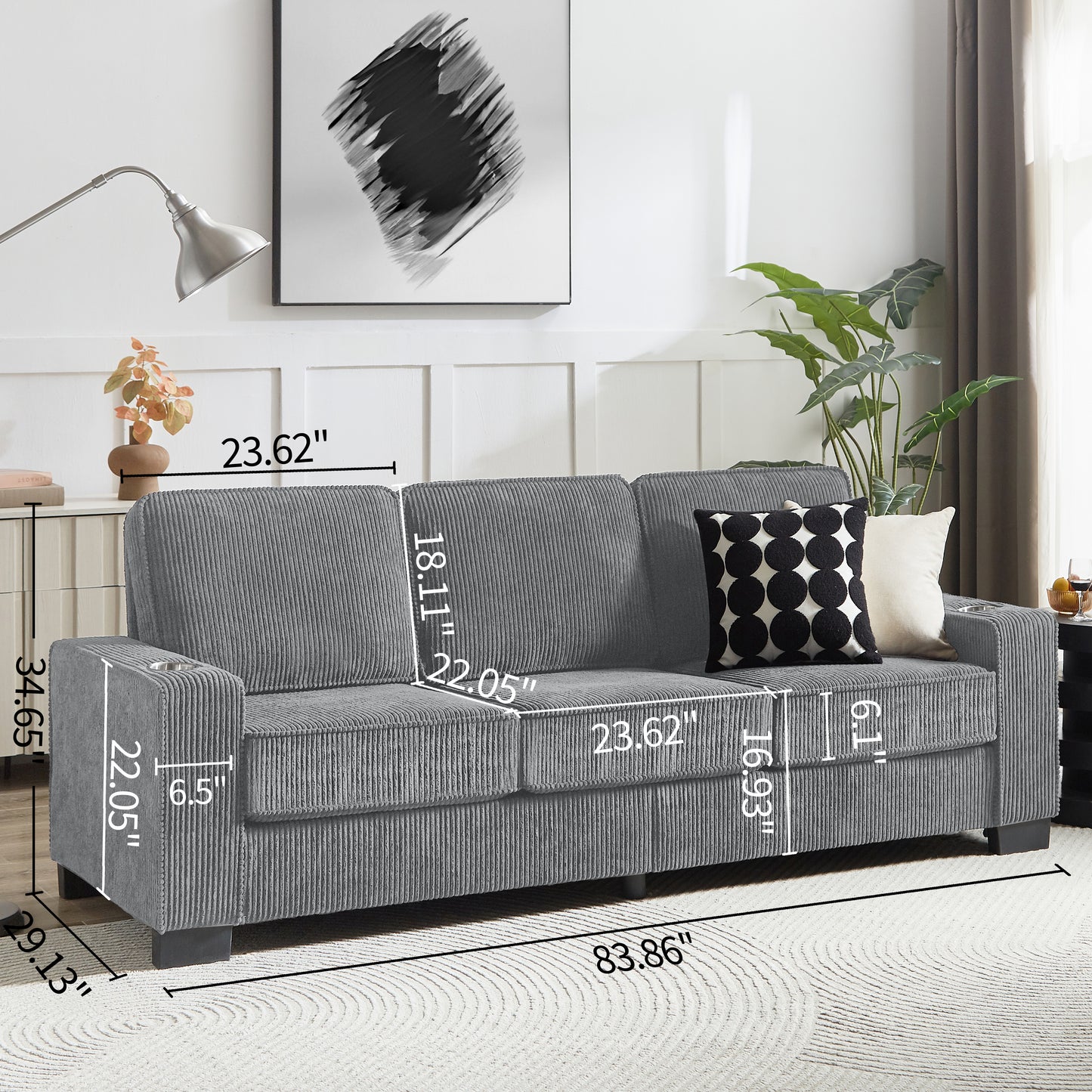 Grey corduroy sofa with builtin cup holders