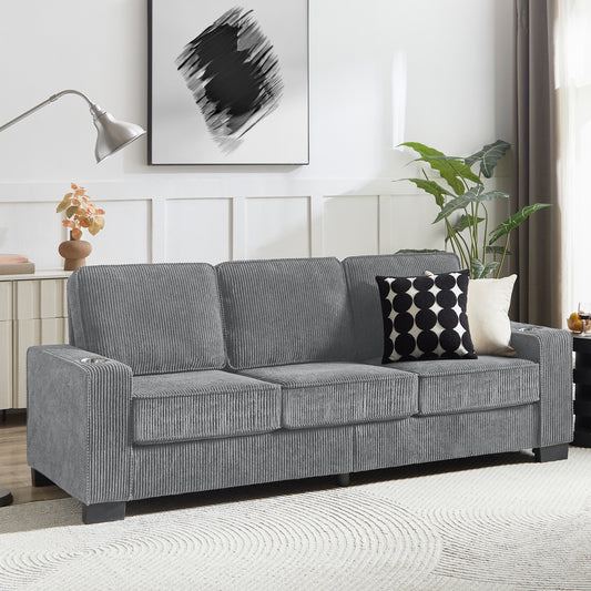 Grey corduroy sofa with builtin cup holders