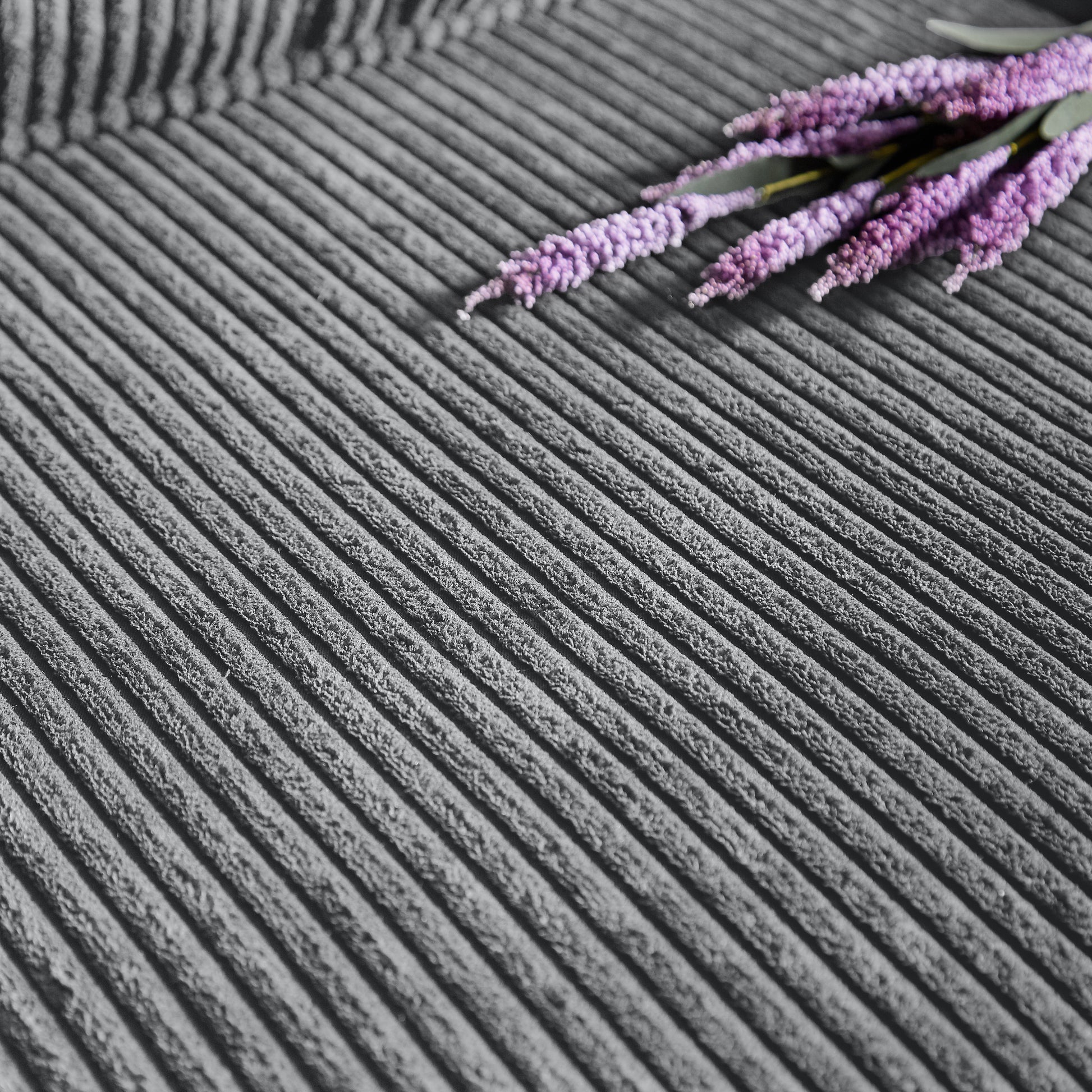 Textured gray corduroy fabric with purple lavender sprigs