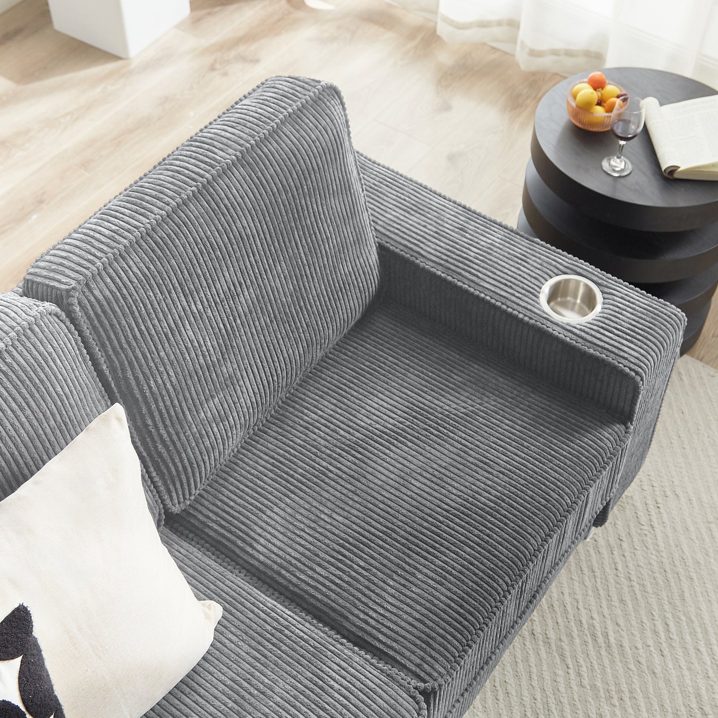 Dark gray corduroy recliner with cup holder