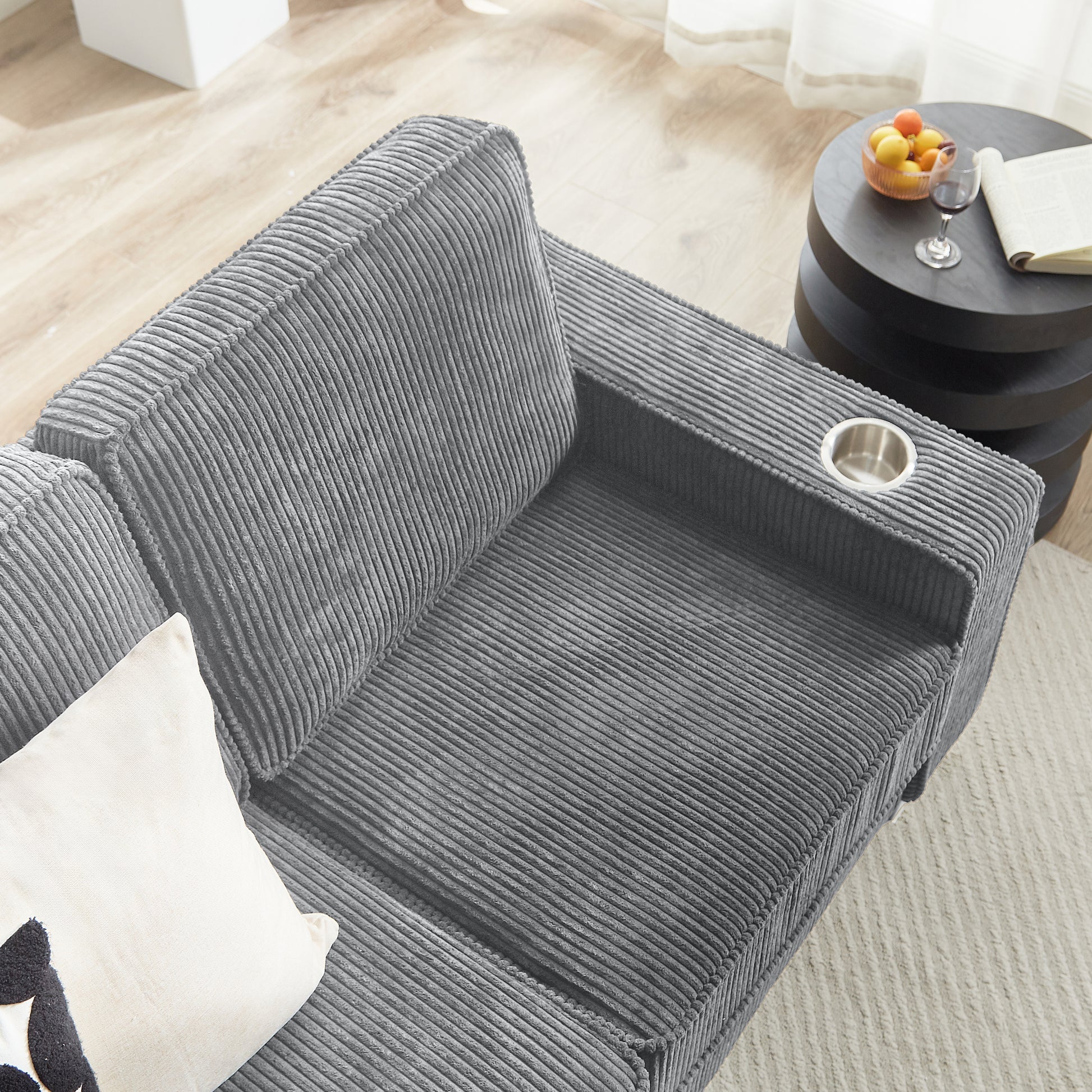 Dark gray corduroy recliner with cup holder