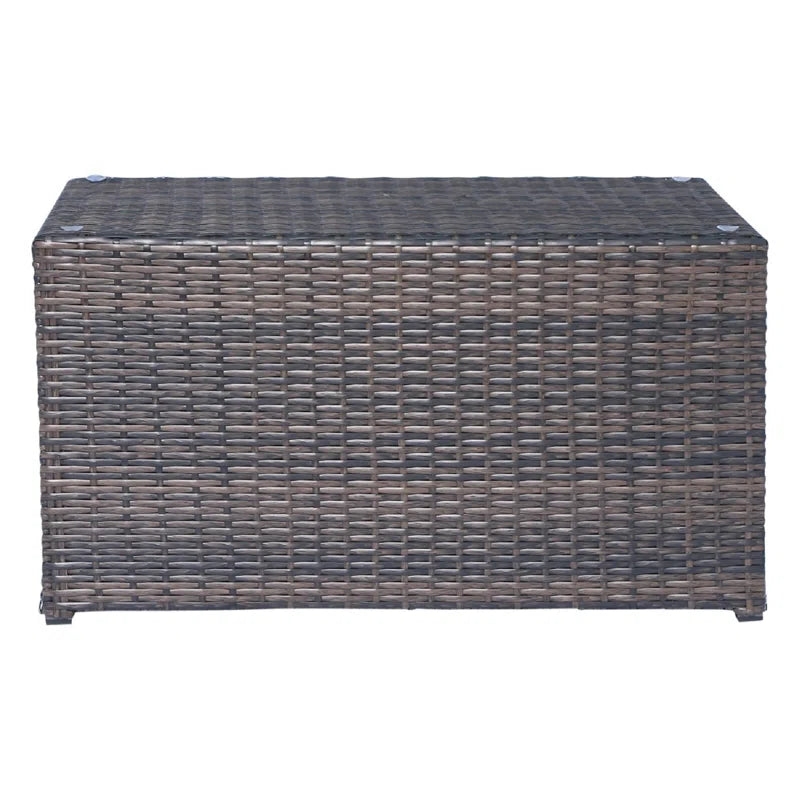 Woven wicker storage bench in grey and brown tones for outdoor patio