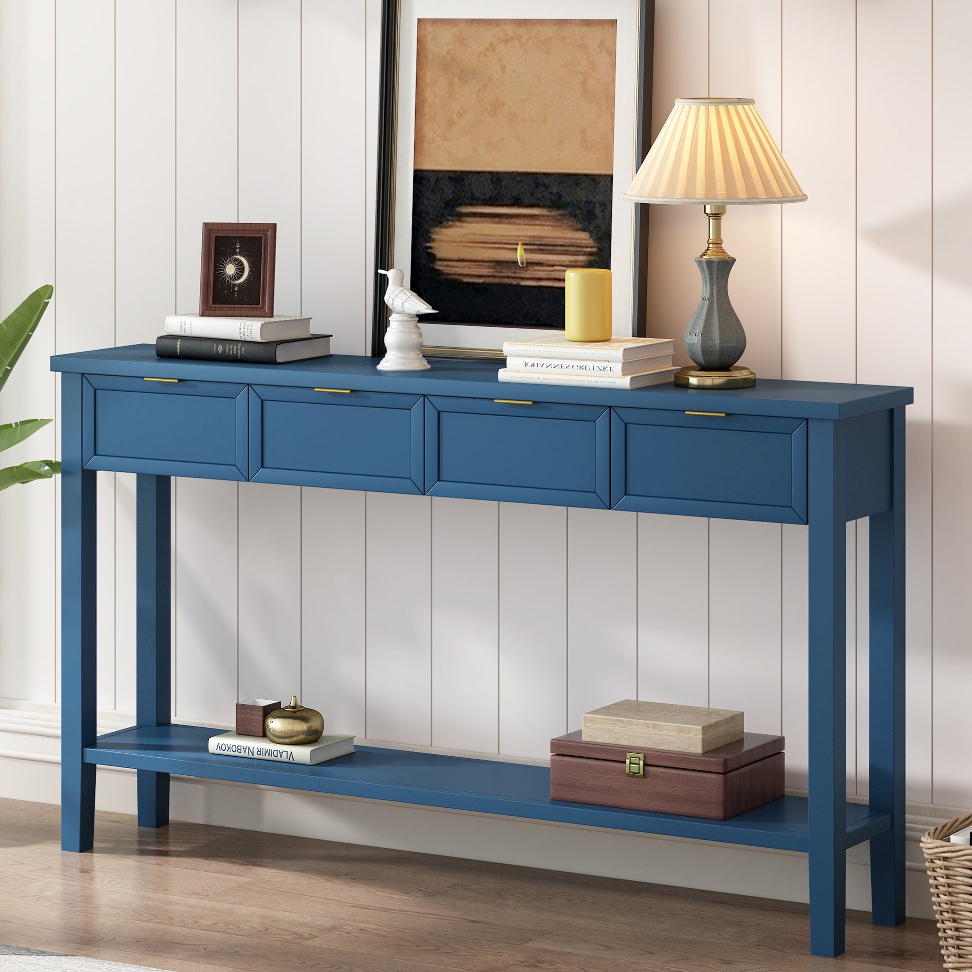 Blue wood console table with four drawers and a lower shelf