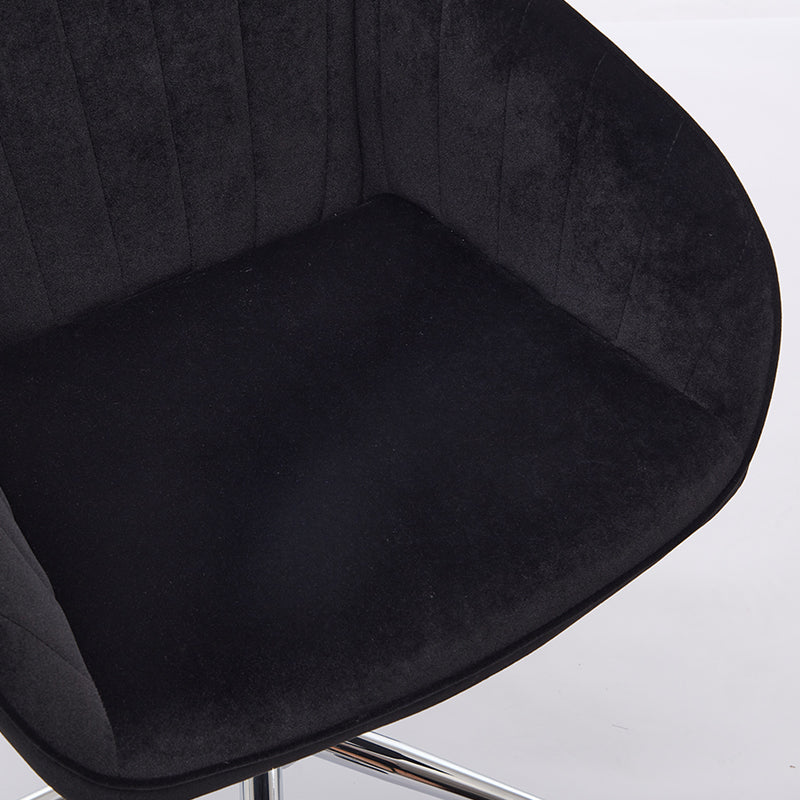 Black velvet accent chair with channel tufting and padded seat