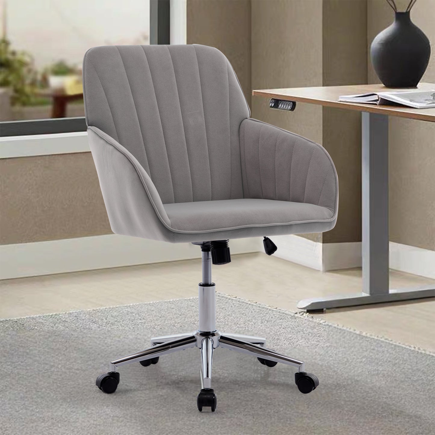 Grey velvet desk chair with channel tufting and silver base