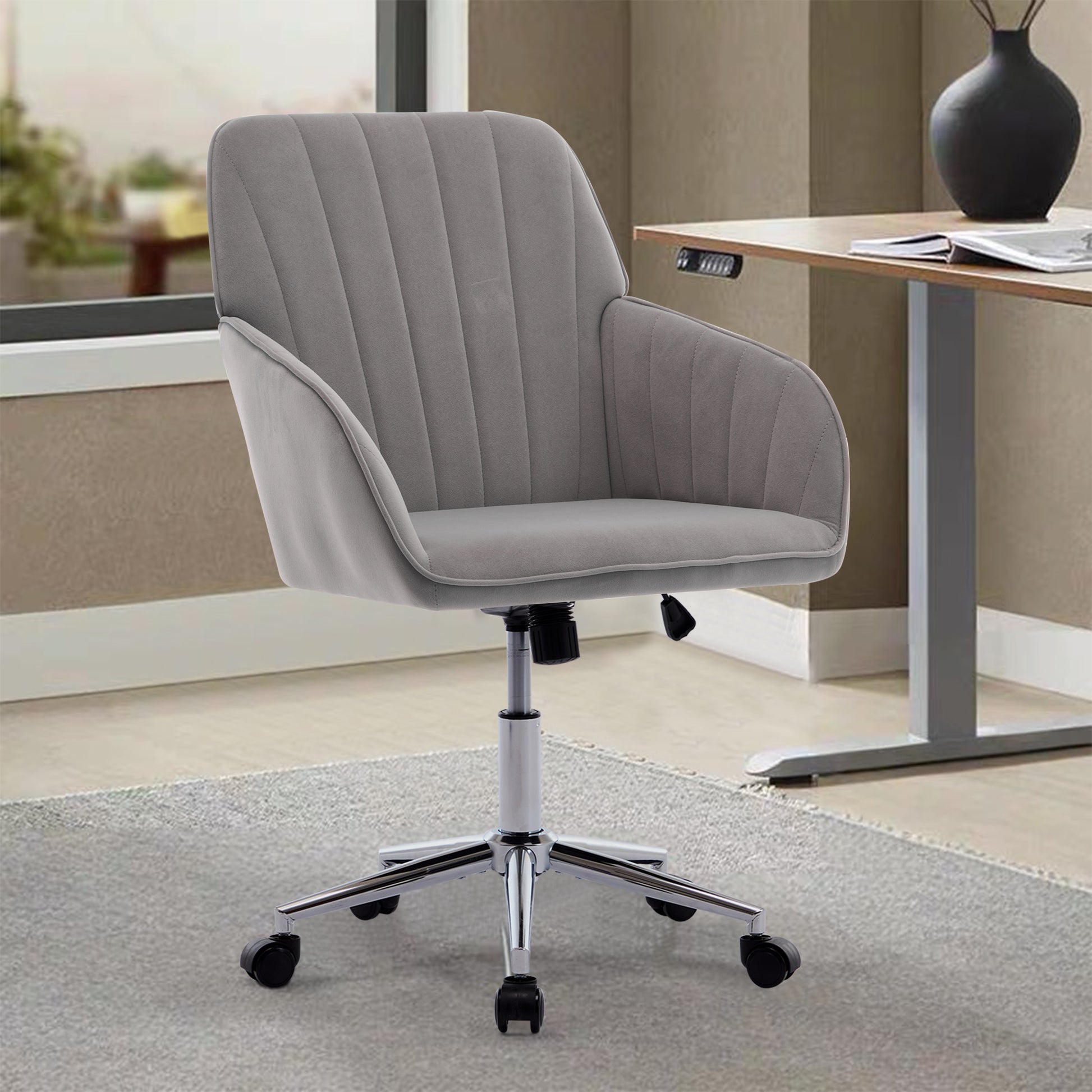 Grey velvet desk chair with channel tufting and silver base