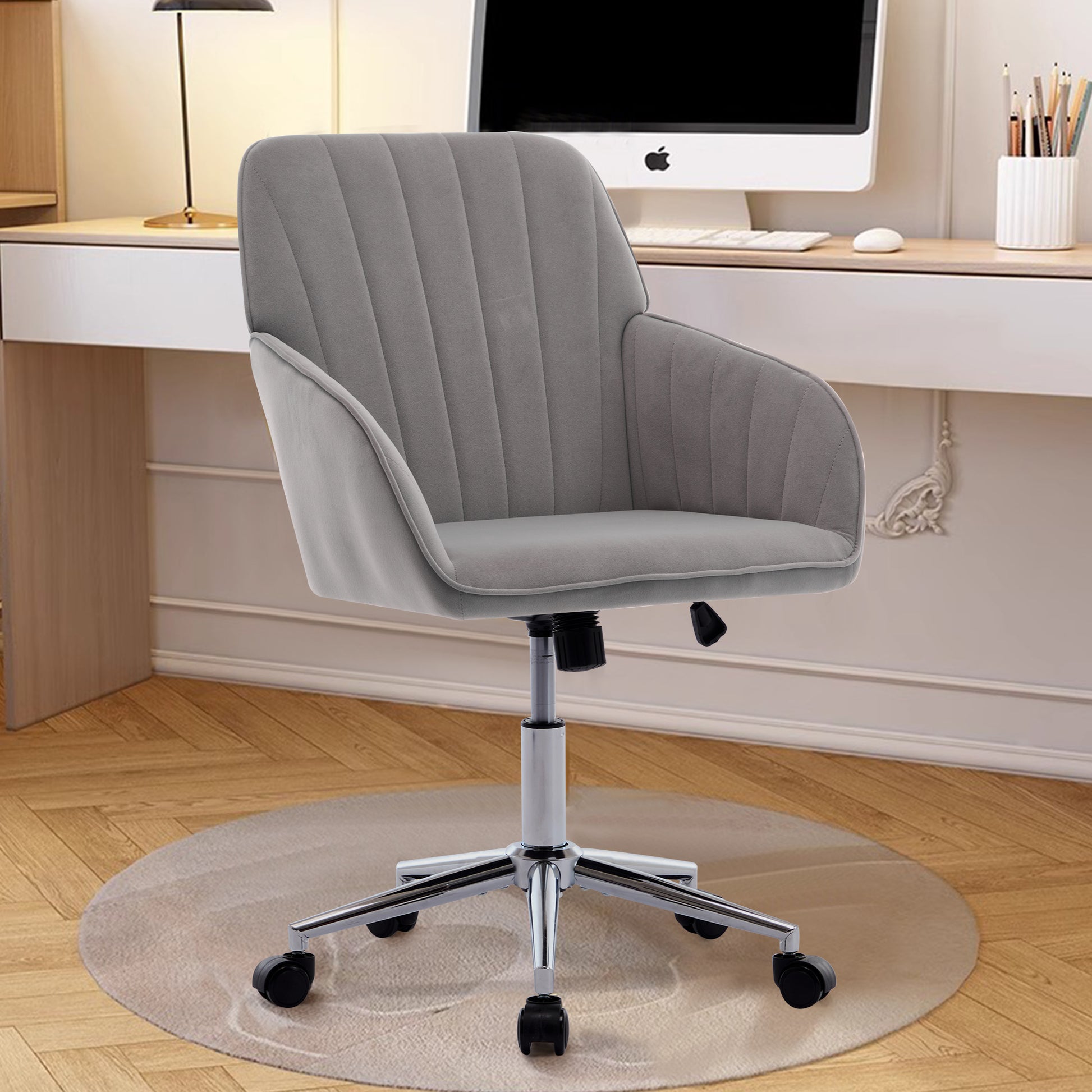 Grey velvet office chair with channel tufting and chrome base