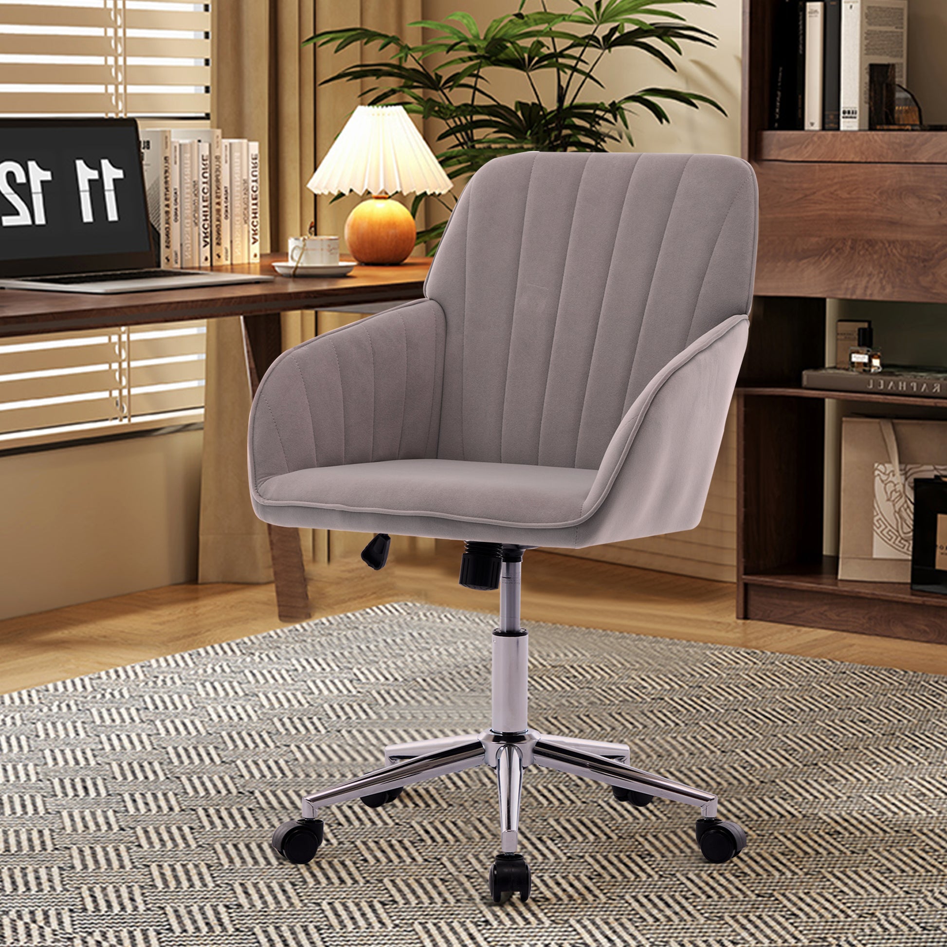 Modern grey velvet office chair with channeled back and chrome base
