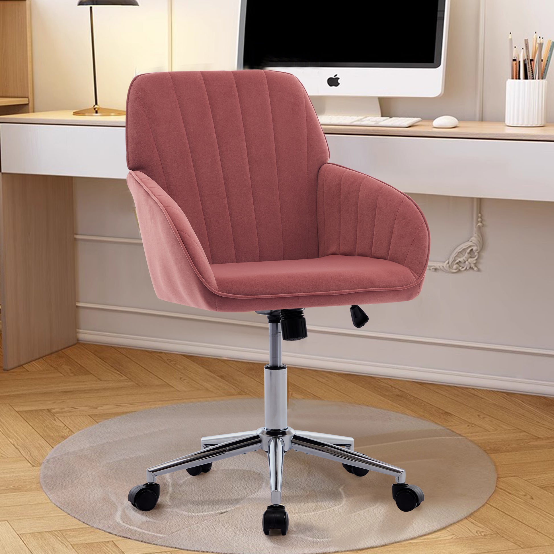 Dusty rose velvet desk chair with tufted back and padded arms