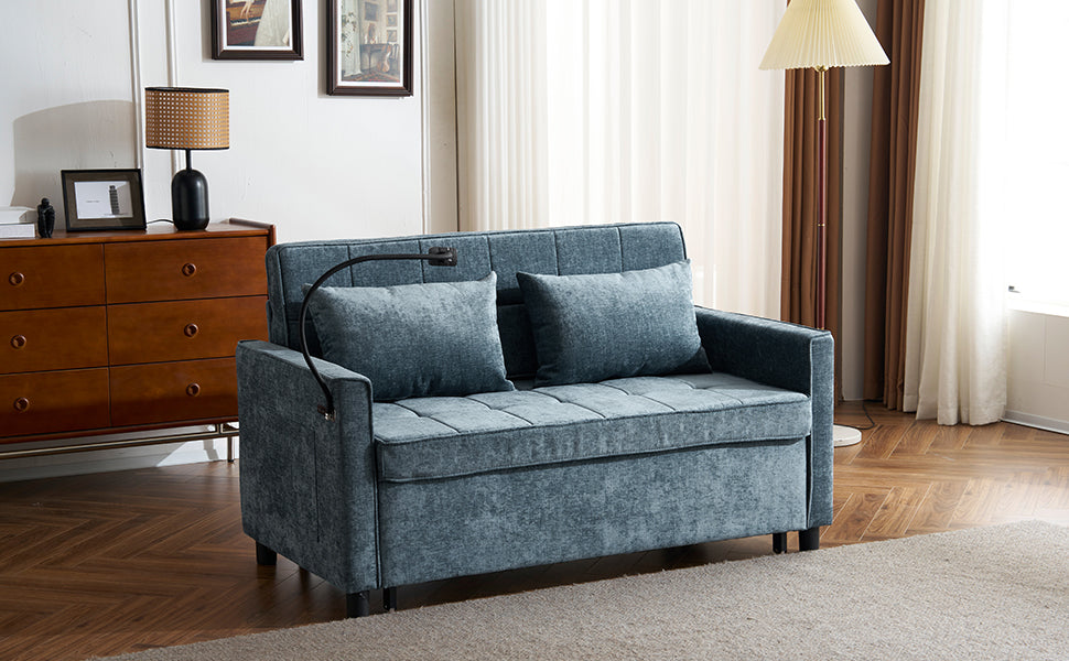 Teal upholstered loveseat sofa with tufted seat and two throw pillows