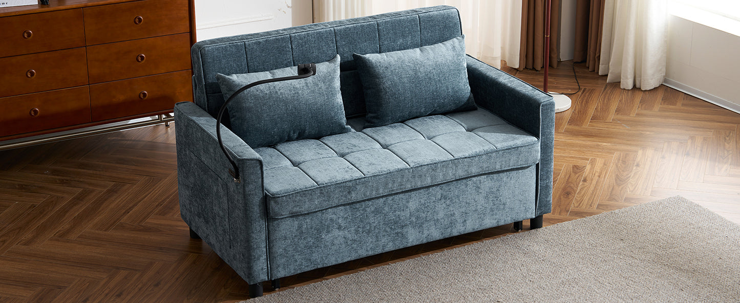 Blue velvet convertible sofa with tufted seat cushions