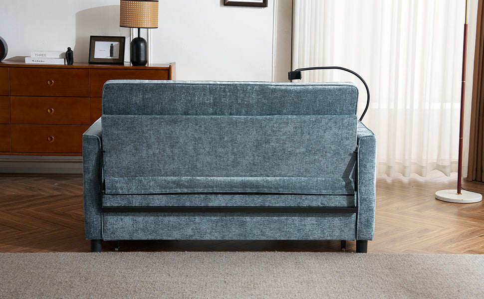 Teal velvet sofa bed with metal frame details