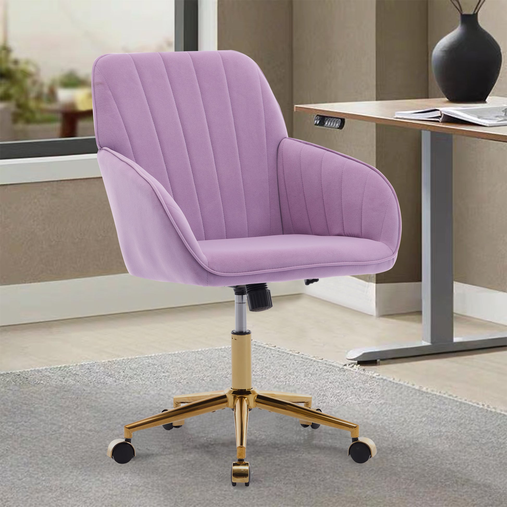 Purple velvet accent chair with gold base and wheels