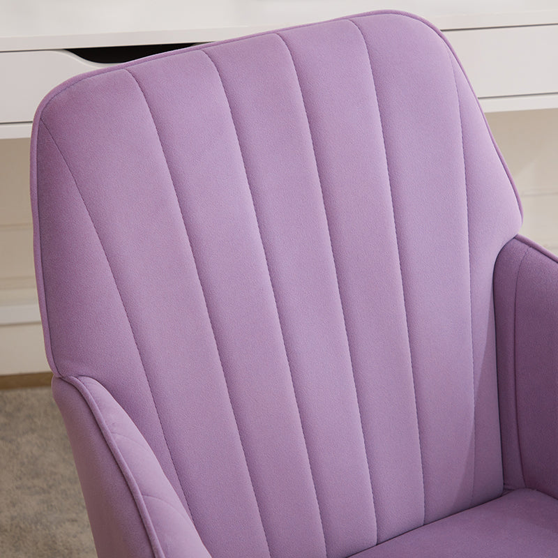 Plush purple velvet accent chair with channel tufting
