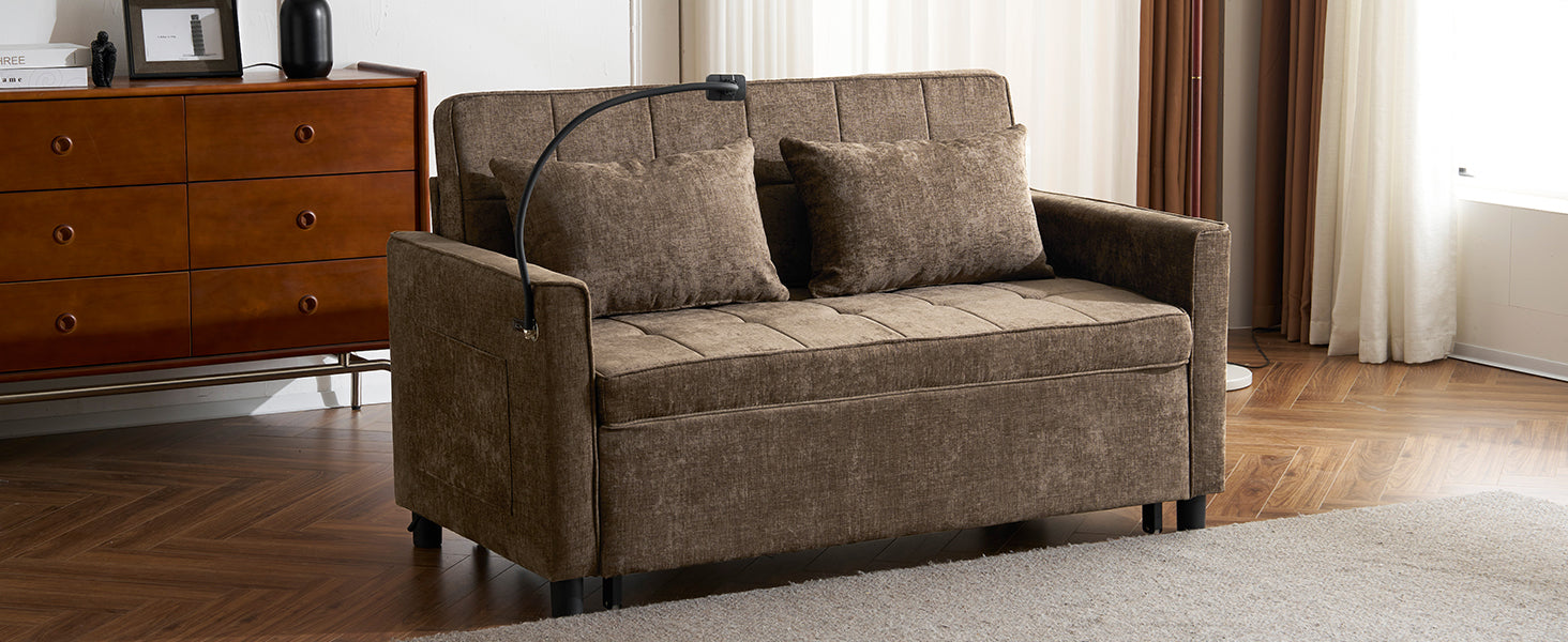Brown fabric loveseat sofa with tufted seat and two pillows