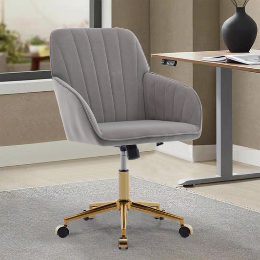 Gray velvet tufted executive chair with polished gold base and casters