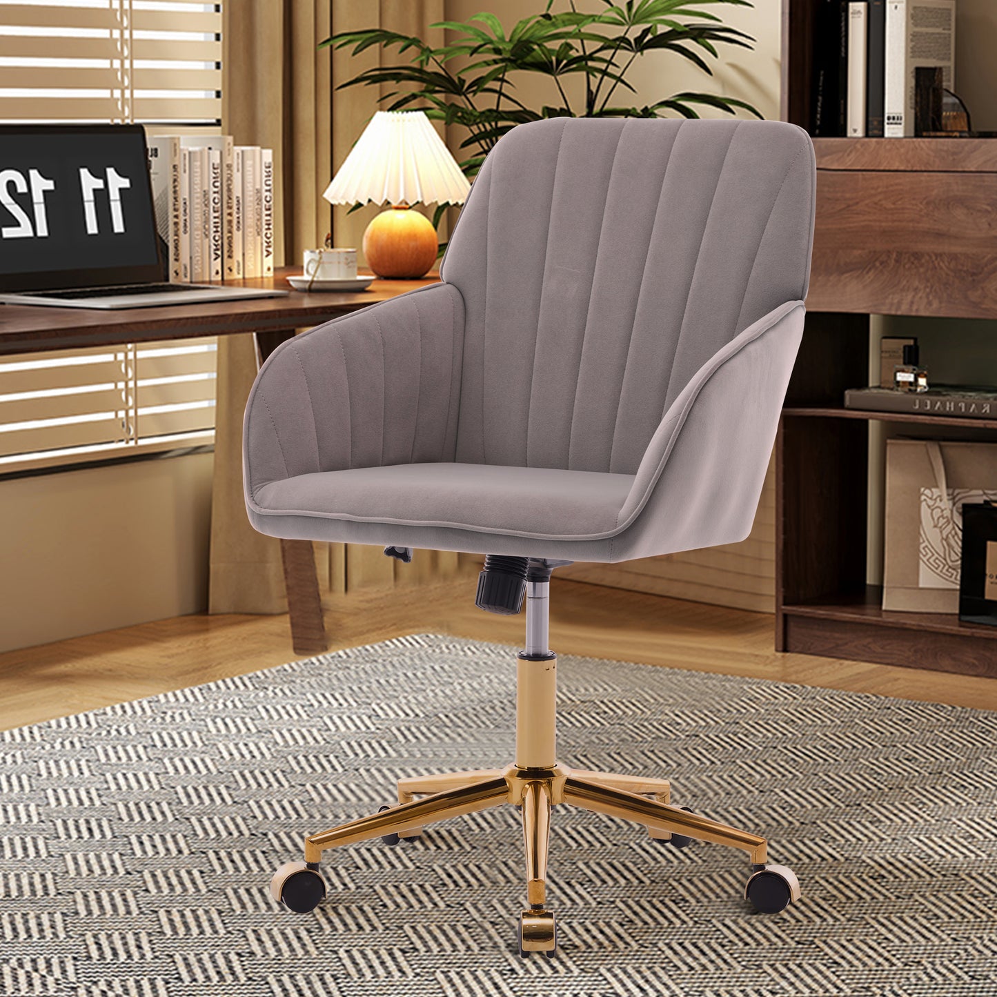 Grey velvet office chair with gold base and wheels