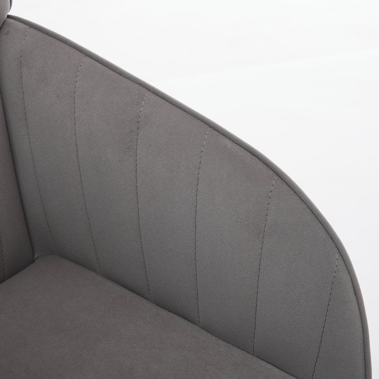 Closeup of upholstered grey modern chair with vertical stitching detail