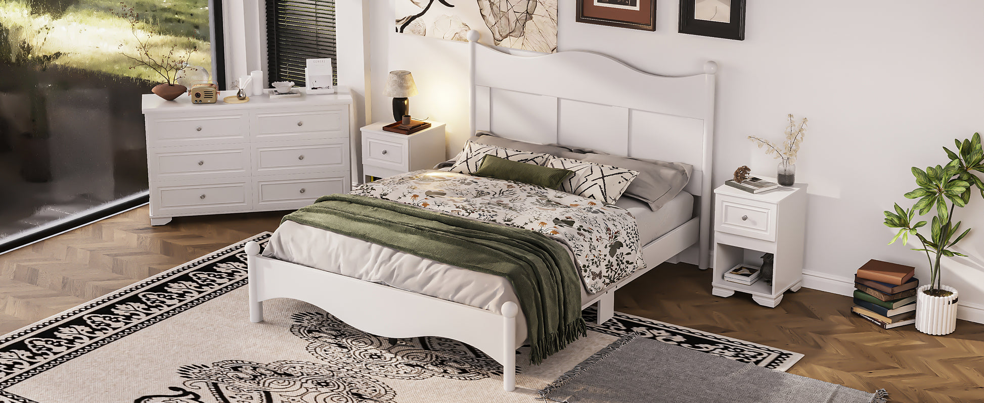 White wooden bed frame with floral bedding and green throw blanket