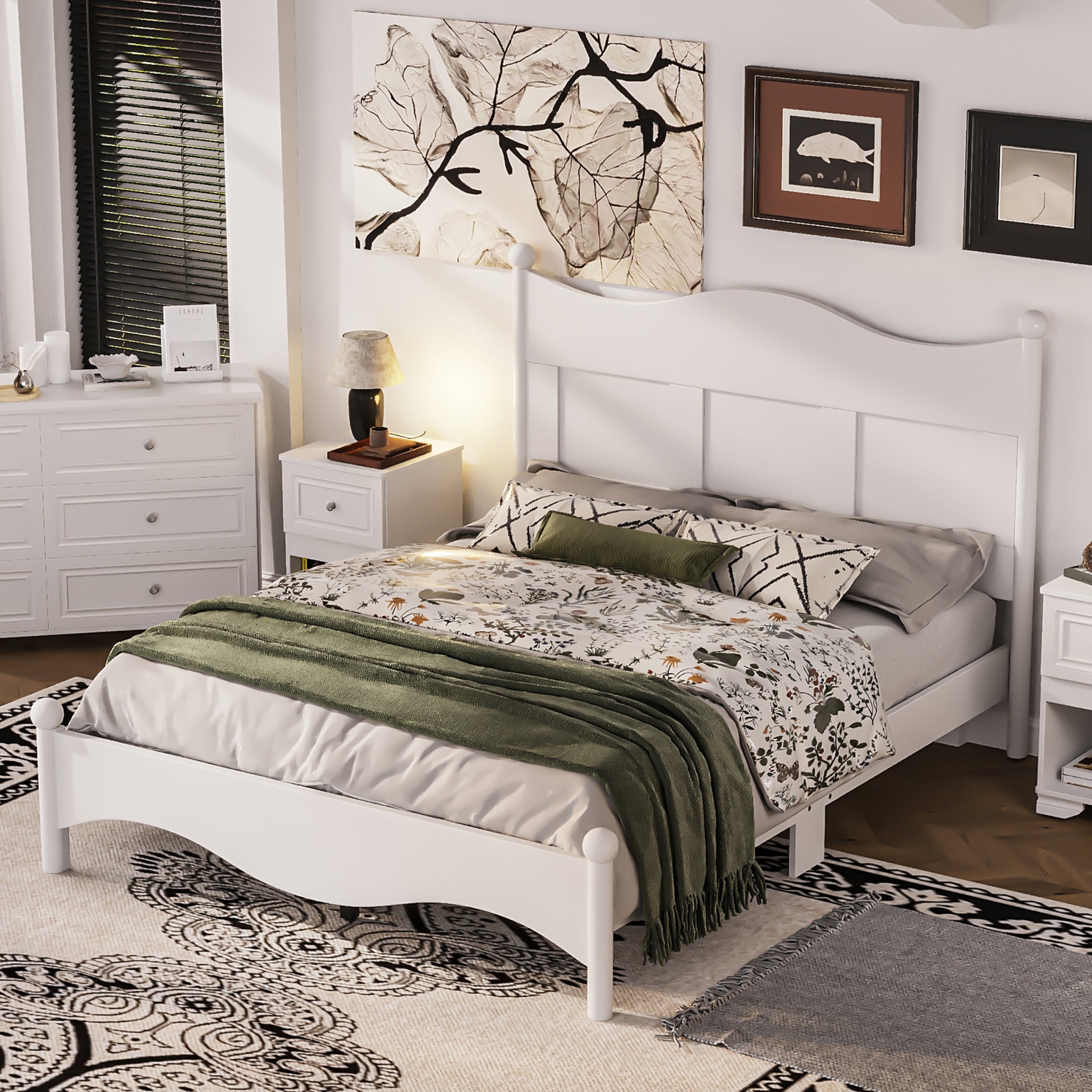 White wooden bed frame with floral duvet and green throw blanket