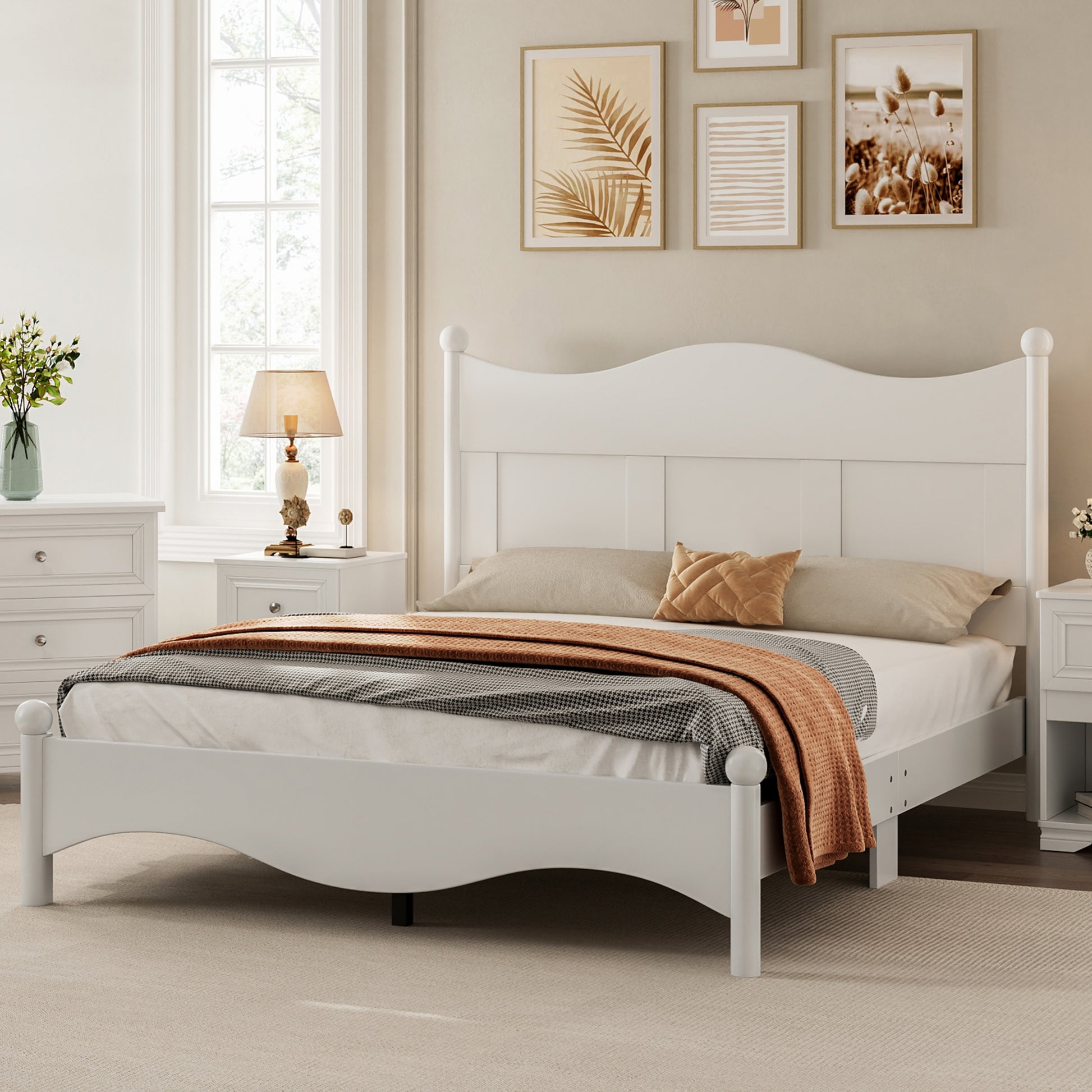 White wooden bed frame with curved headboard and footboard