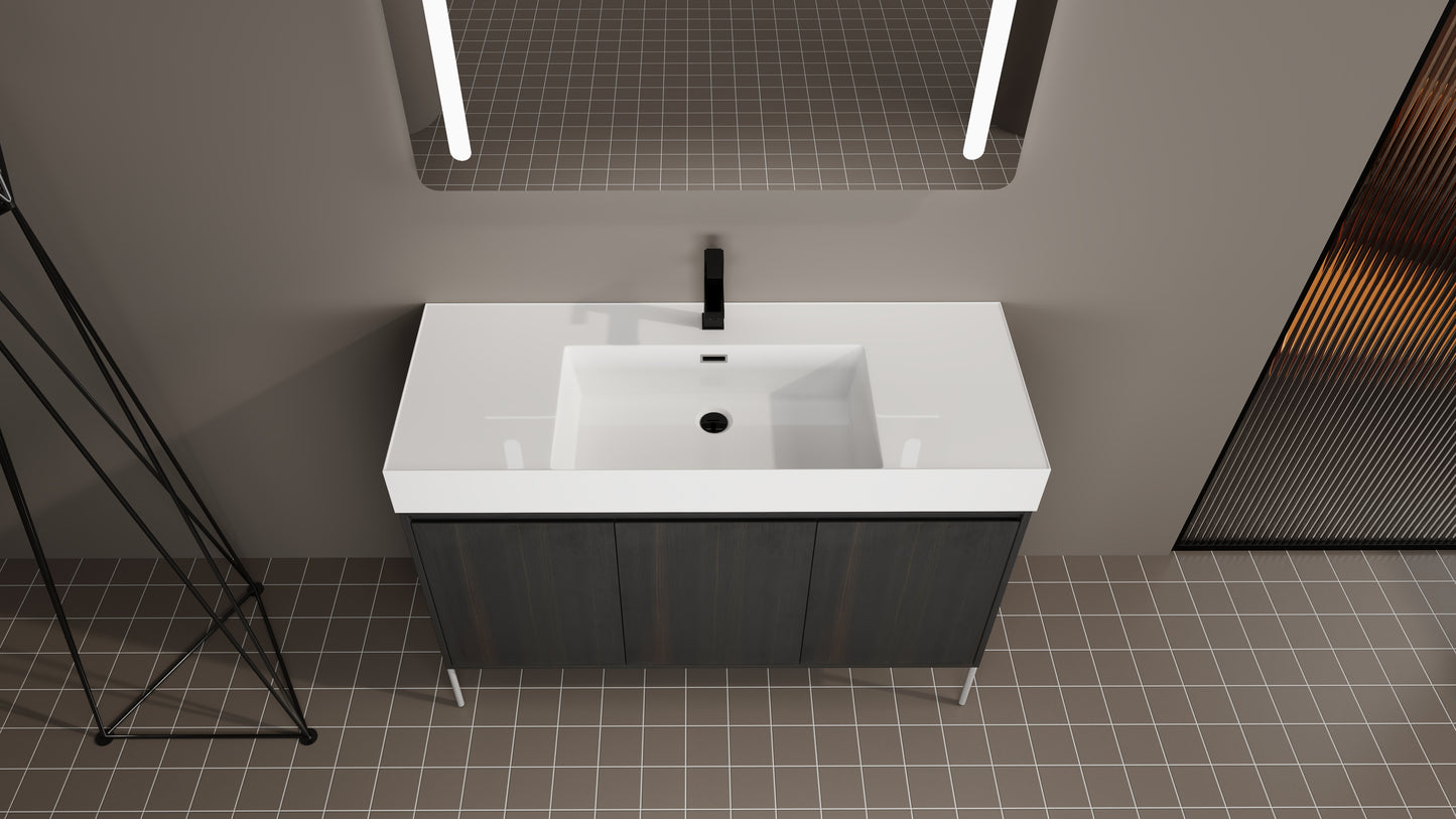 Modern dark wood bathroom vanity with white integrated sink and black faucet