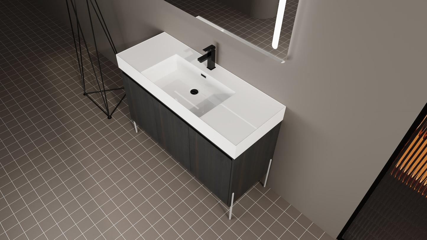 Modern dark wood bathroom vanity with integrated white sink and black faucet