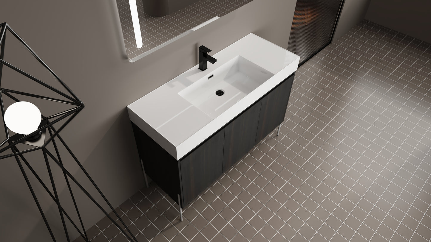 Modern white ceramic basin with dark wood vanity and black faucet
