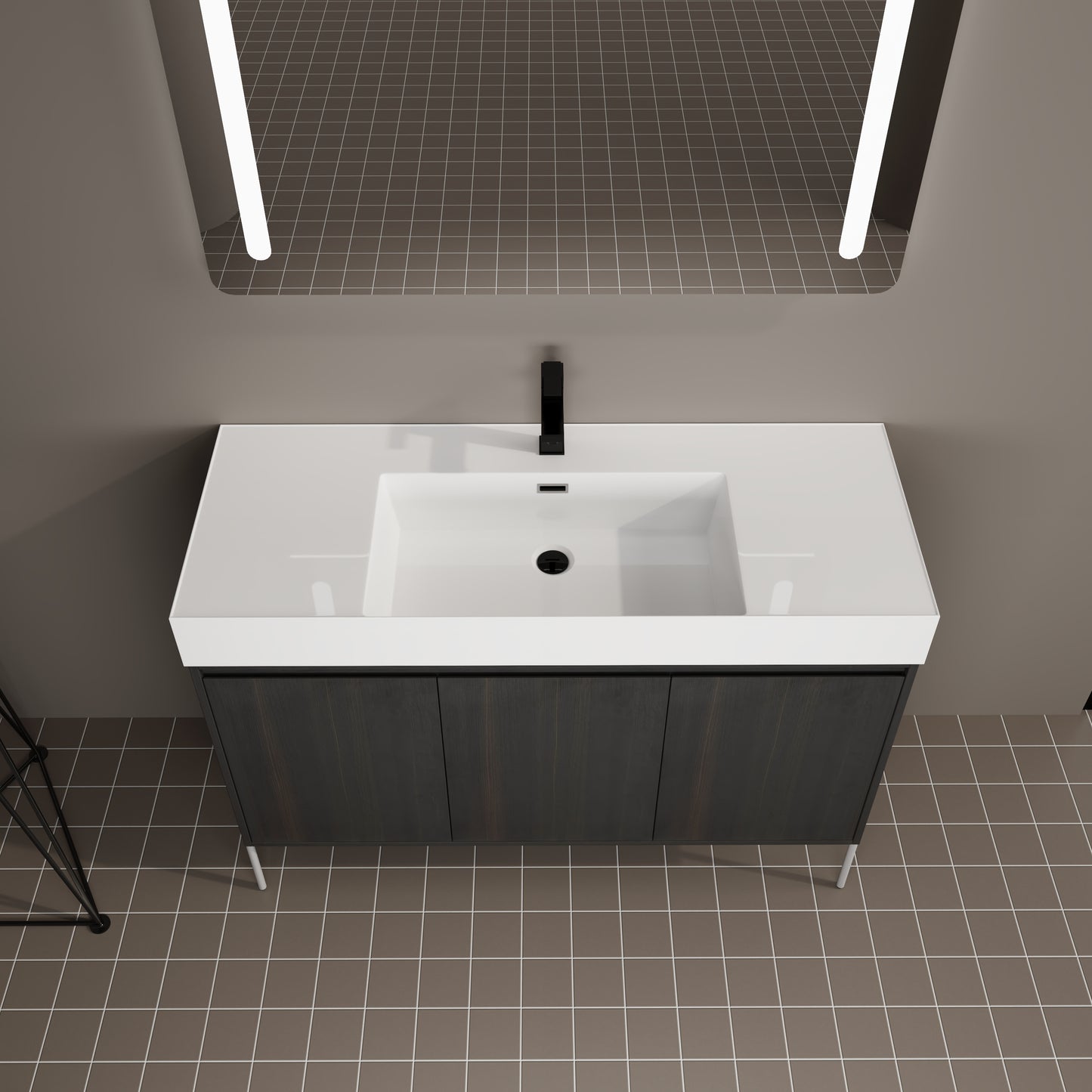 Modern dark wood vanity with white integrated sink and black faucet