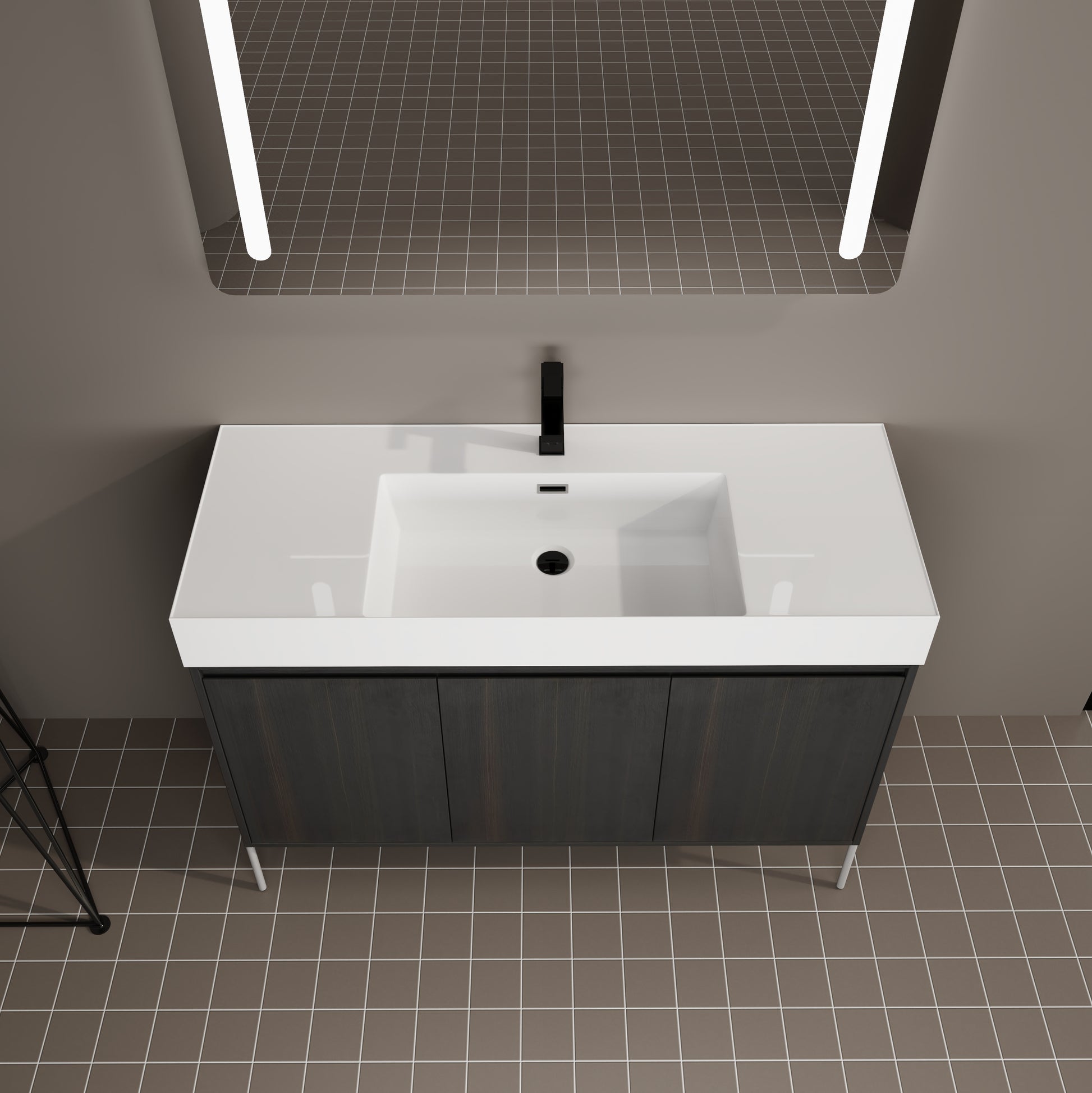 Modern dark wood vanity with white integrated sink and black faucet