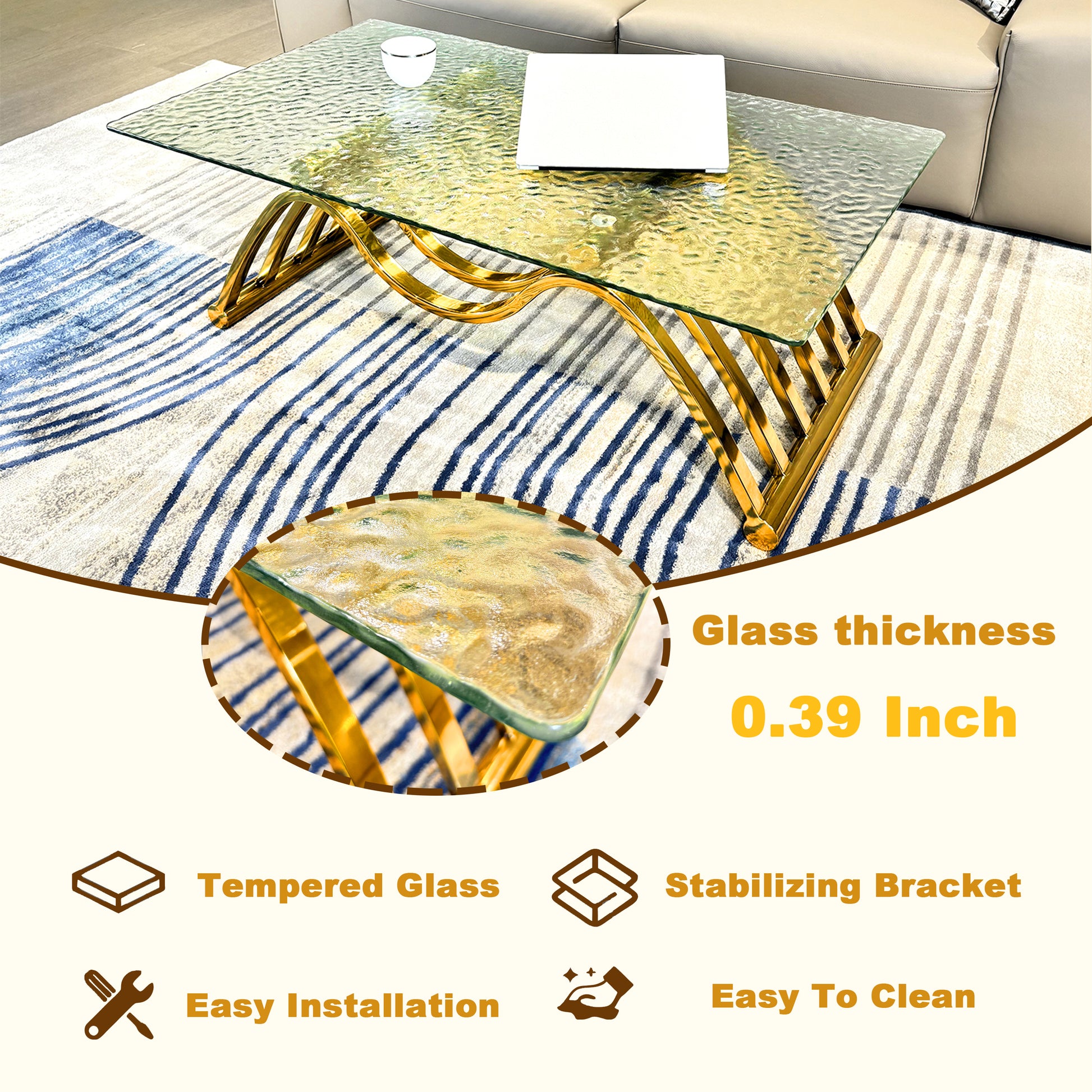 Textured glass coffee table with gold metal legs on striped rug