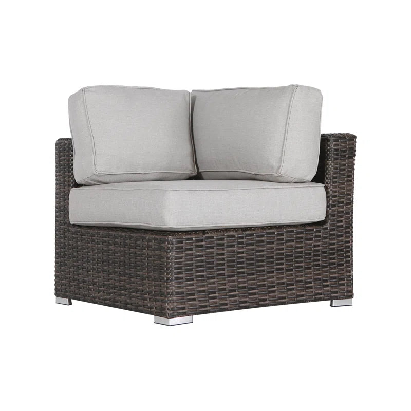 Dark brown wicker patio sectional chair with light gray cushions and silver feet