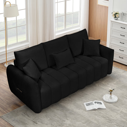 Black modern fabric sofa with channel tufting and decorative pillows