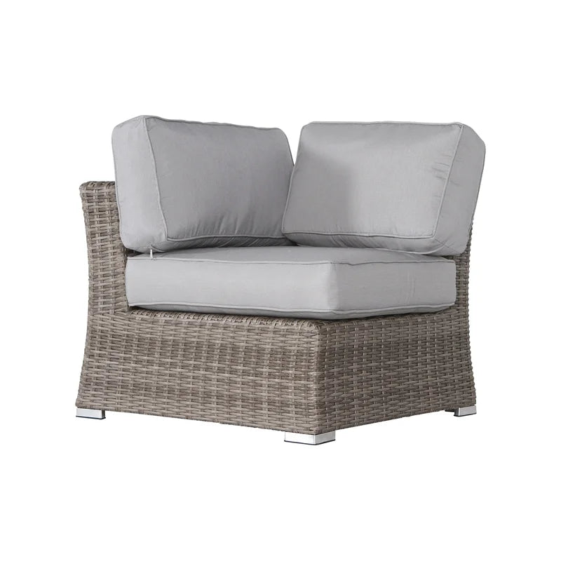 Wicker outdoor corner sofa with plush grey cushions